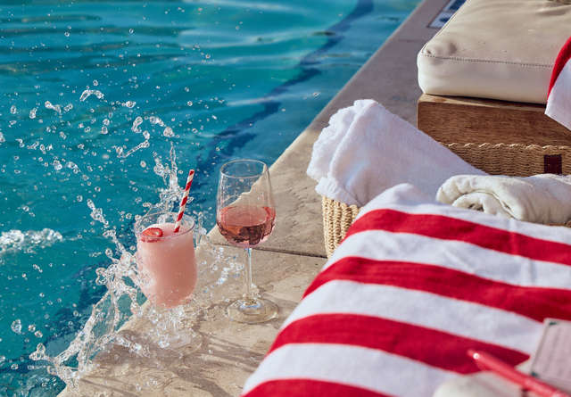 Vibrant poolside club at Virgin Hotels Nashville with modern lounge seating, ideal for social gatherings and relaxation.
